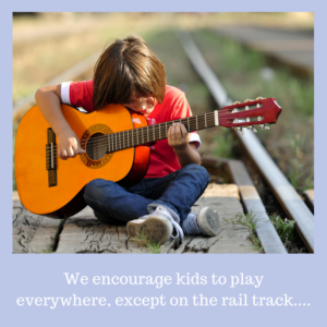 kid playing guitar