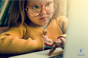 girl playing with computer