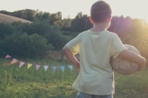 kid and soccer ball